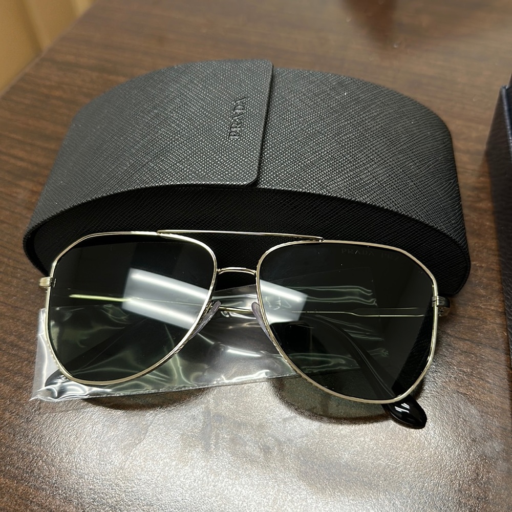 New in box Prada sunglasses ladies